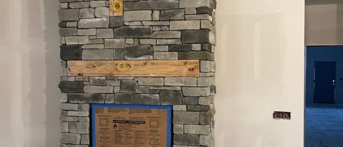 floor-to-ceiling-stone-fireplace
