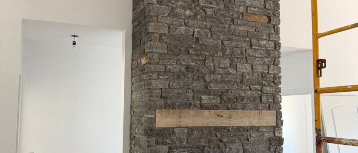 tall-gray-stone-fireplace-front