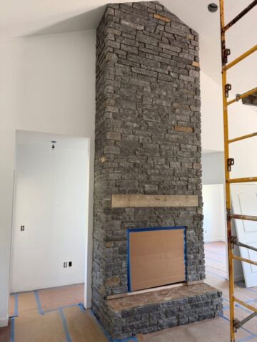 tall-gray-stone-fireplace-front